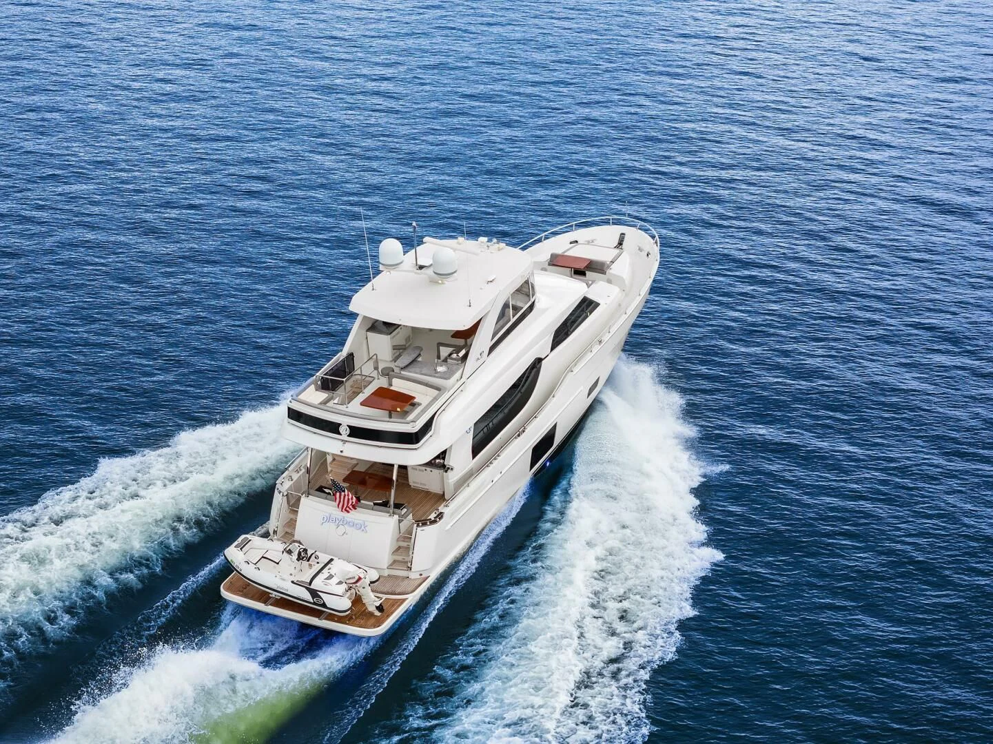a boat on the water aboard PLAYBOOK Yacht for Sale