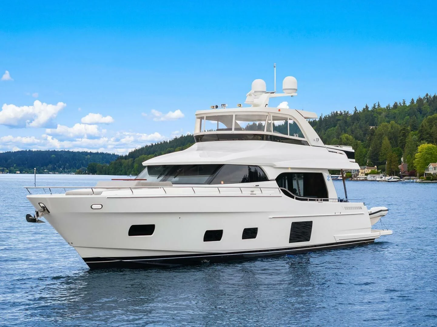 a white yacht on the water aboard PLAYBOOK Yacht for Sale