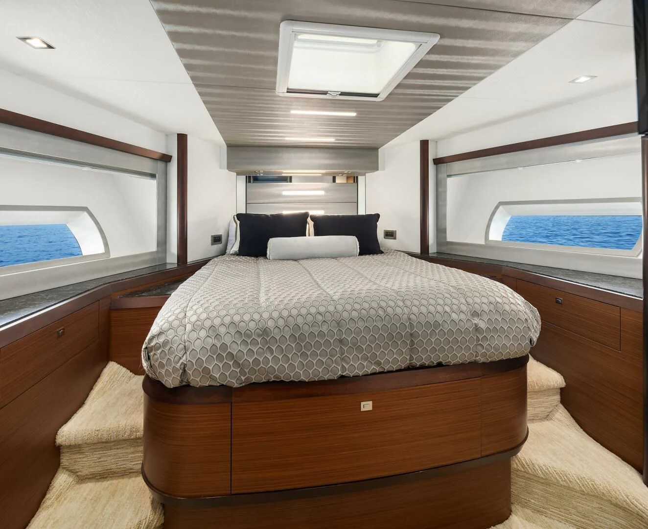 a bed in a room aboard PLAYBOOK Yacht for Sale