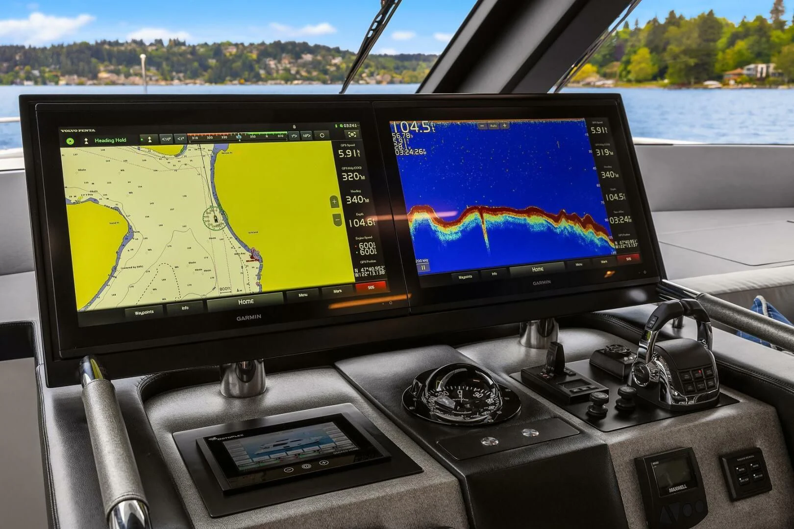 a couple of monitors on a car aboard PLAYBOOK Yacht for Sale