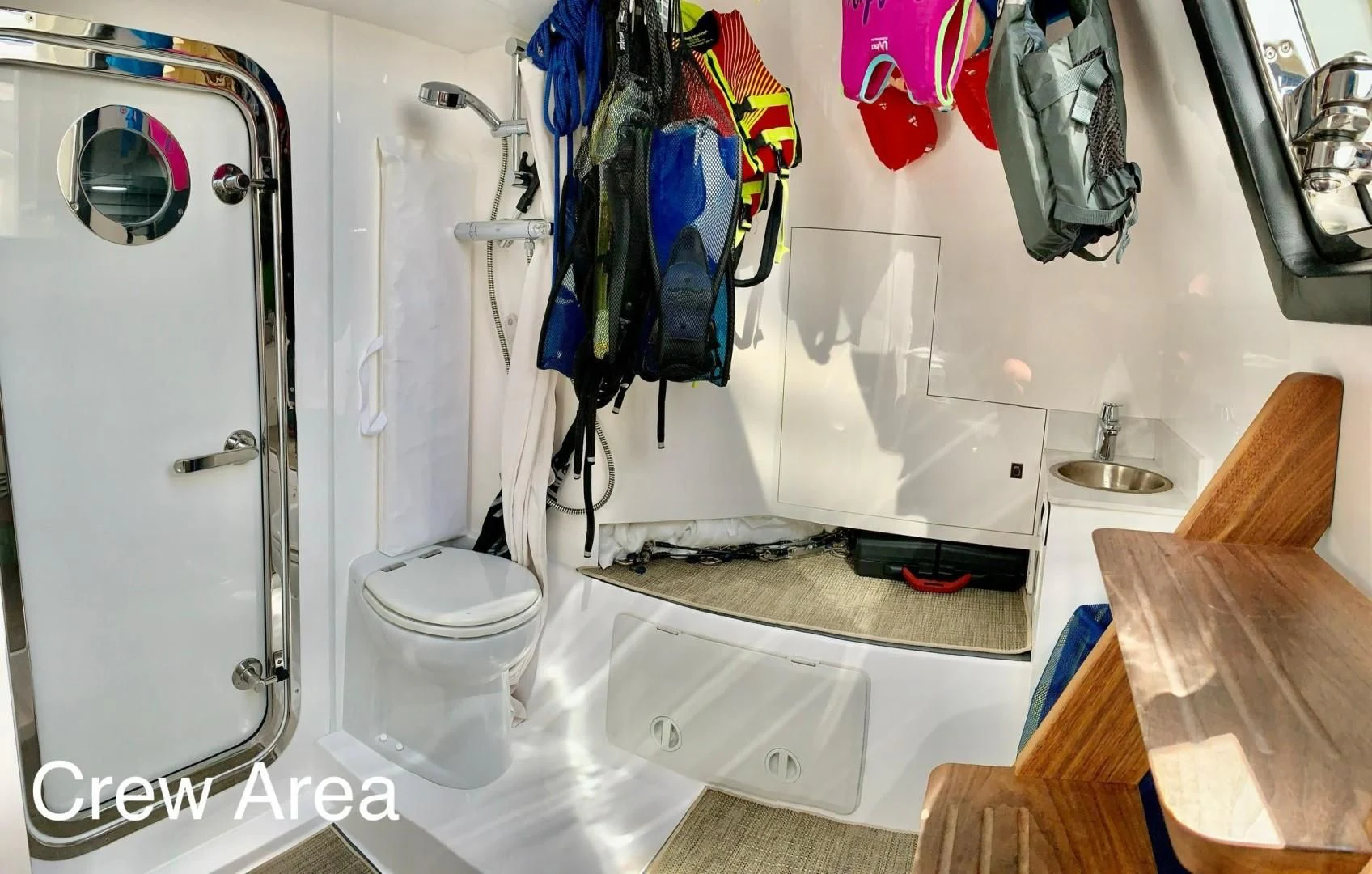 a bathroom with a sink and toilet aboard PLAYBOOK Yacht for Sale