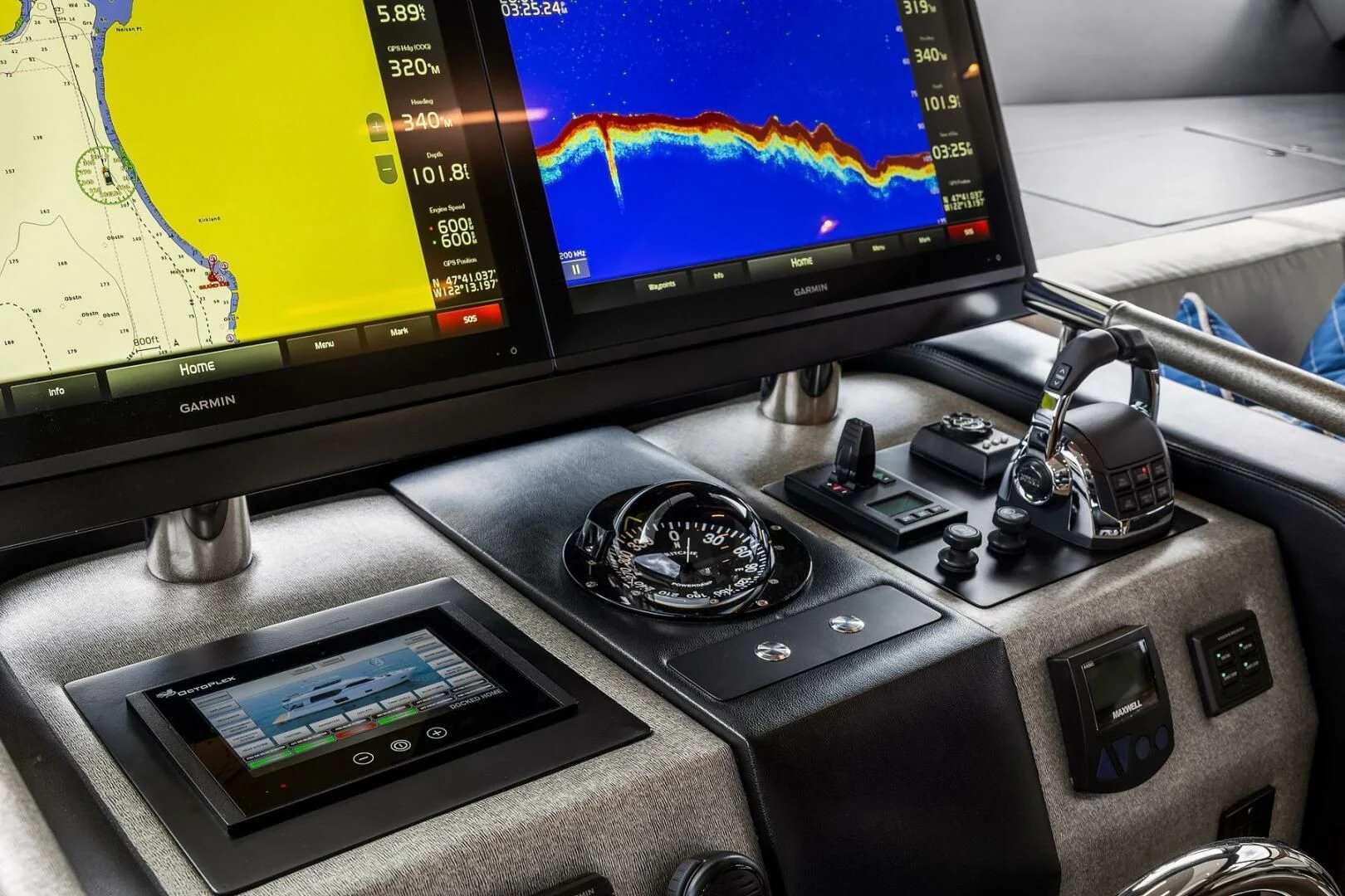 a gaming console with a monitor and a keyboard aboard PLAYBOOK Yacht for Sale