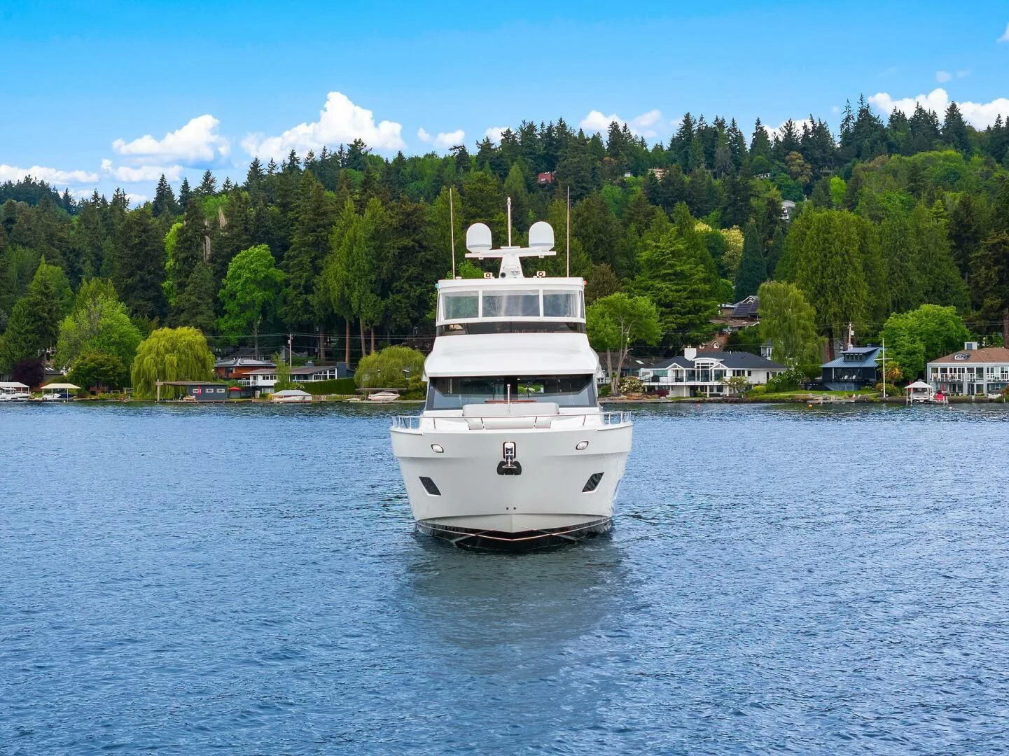 a couple of boats on the water aboard PLAYBOOK Yacht for Sale