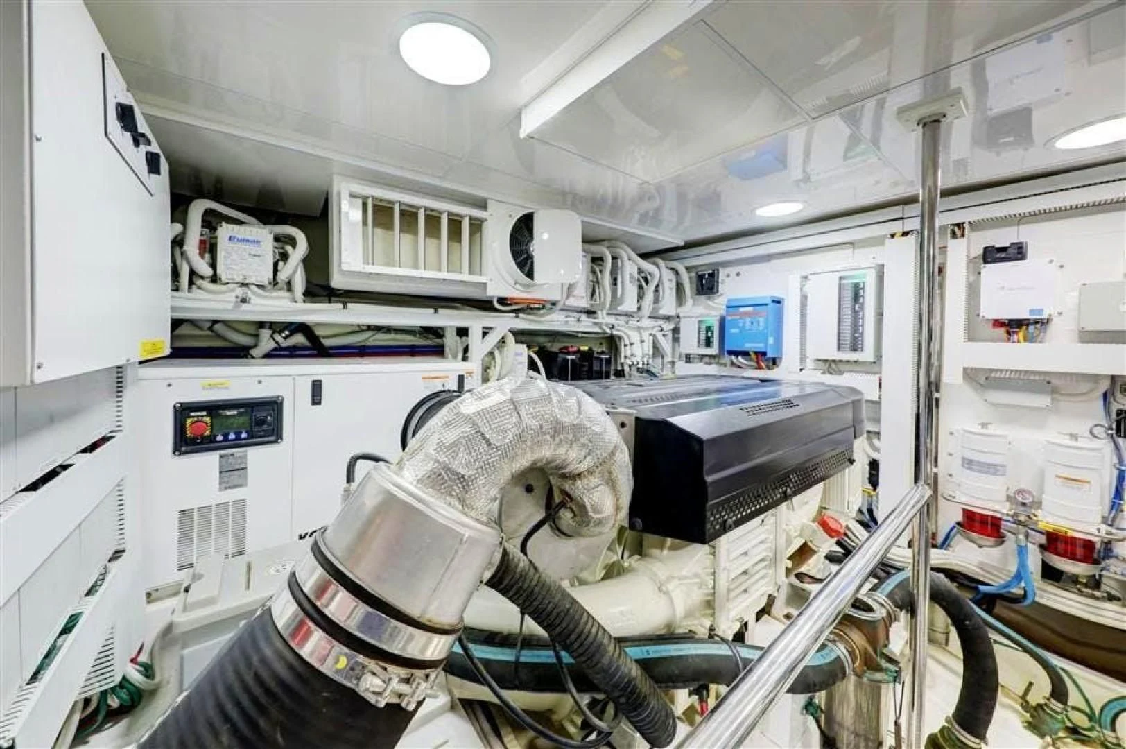 a person in a lab coat aboard PLAYBOOK Yacht for Sale