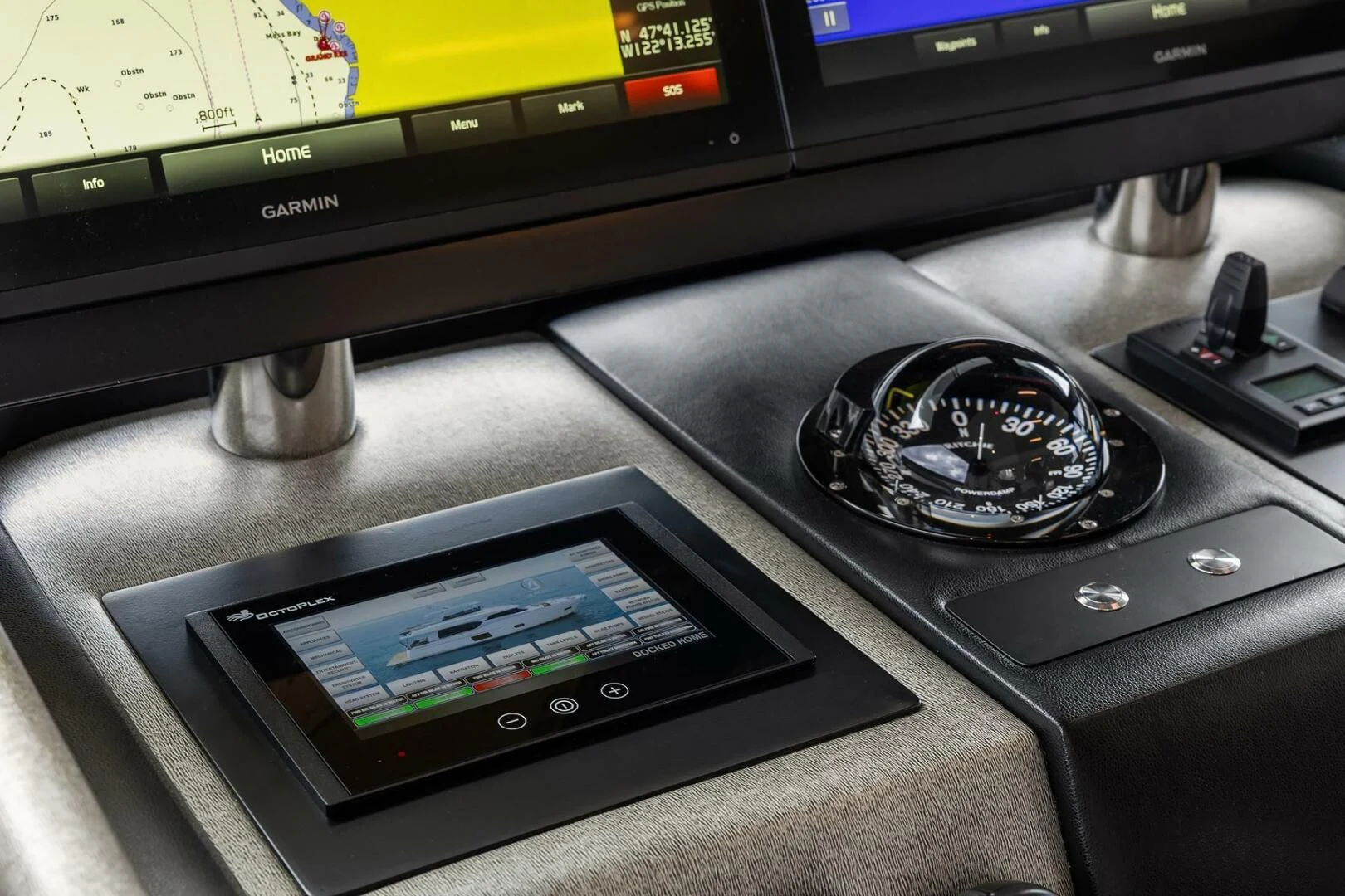 a black electronic device aboard PLAYBOOK Yacht for Sale
