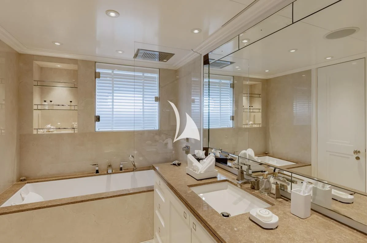 a bathroom with a large mirror aboard IDEFIX II Yacht for Charter