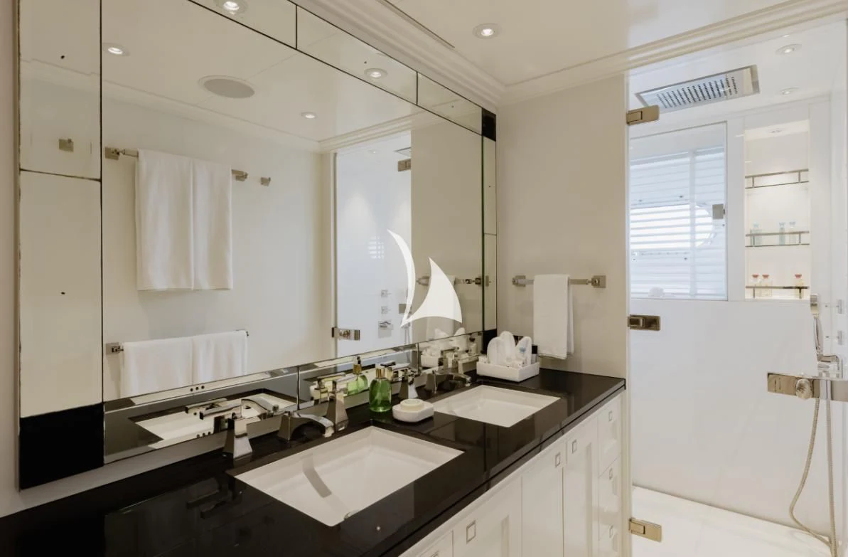 a bathroom with sinks and mirrors aboard IDEFIX II Yacht for Charter