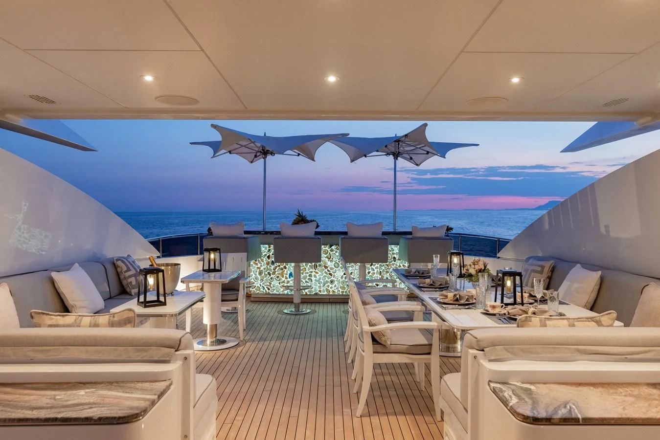 a room with a view of the ocean and the pool aboard IDEFIX II Yacht for Charter