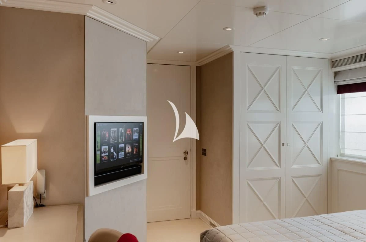 a tv on a wall aboard IDEFIX II Yacht for Charter