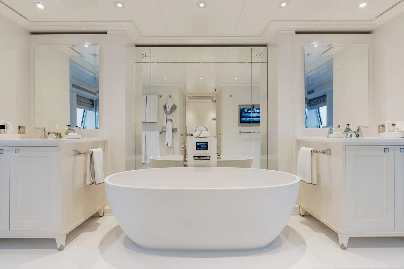 a large white bathroom aboard IDEFIX II Yacht for Charter