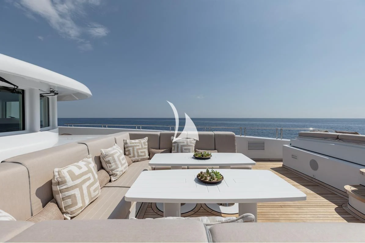 a living room with a large body of water aboard IDEFIX II Yacht for Charter