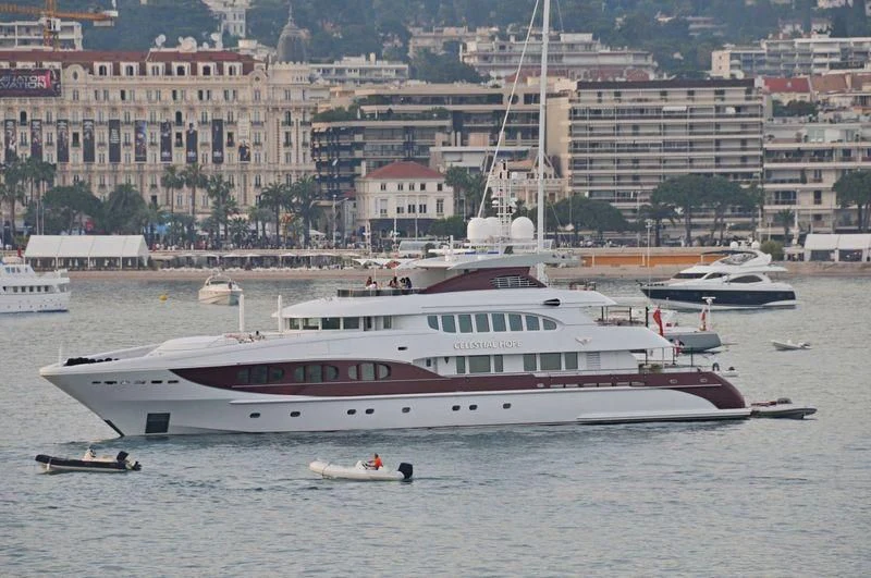 a large white boat in the water aboard IDEFIX II Yacht for Charter