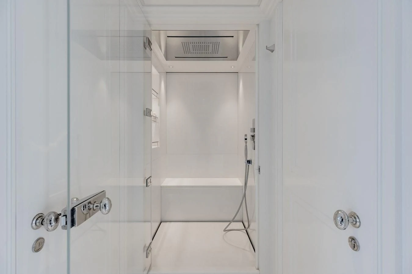 a white cabinet with a vent aboard IDEFIX II Yacht for Charter