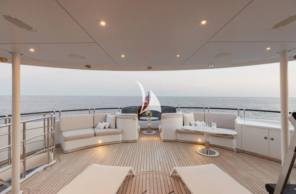a large living room with a large body of water aboard IDEFIX II Yacht for Charter