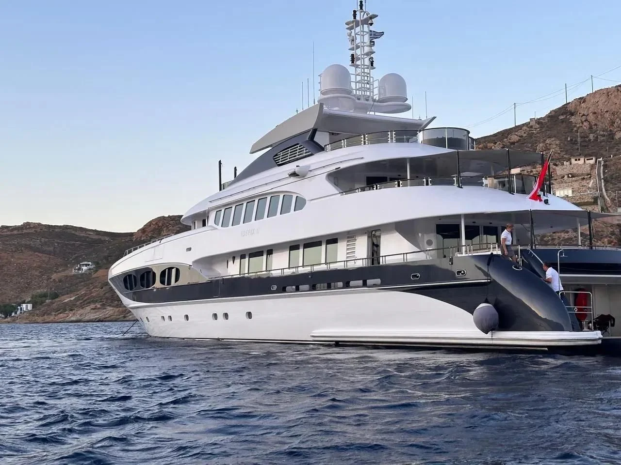 a large white boat on the water aboard IDEFIX II Yacht for Charter