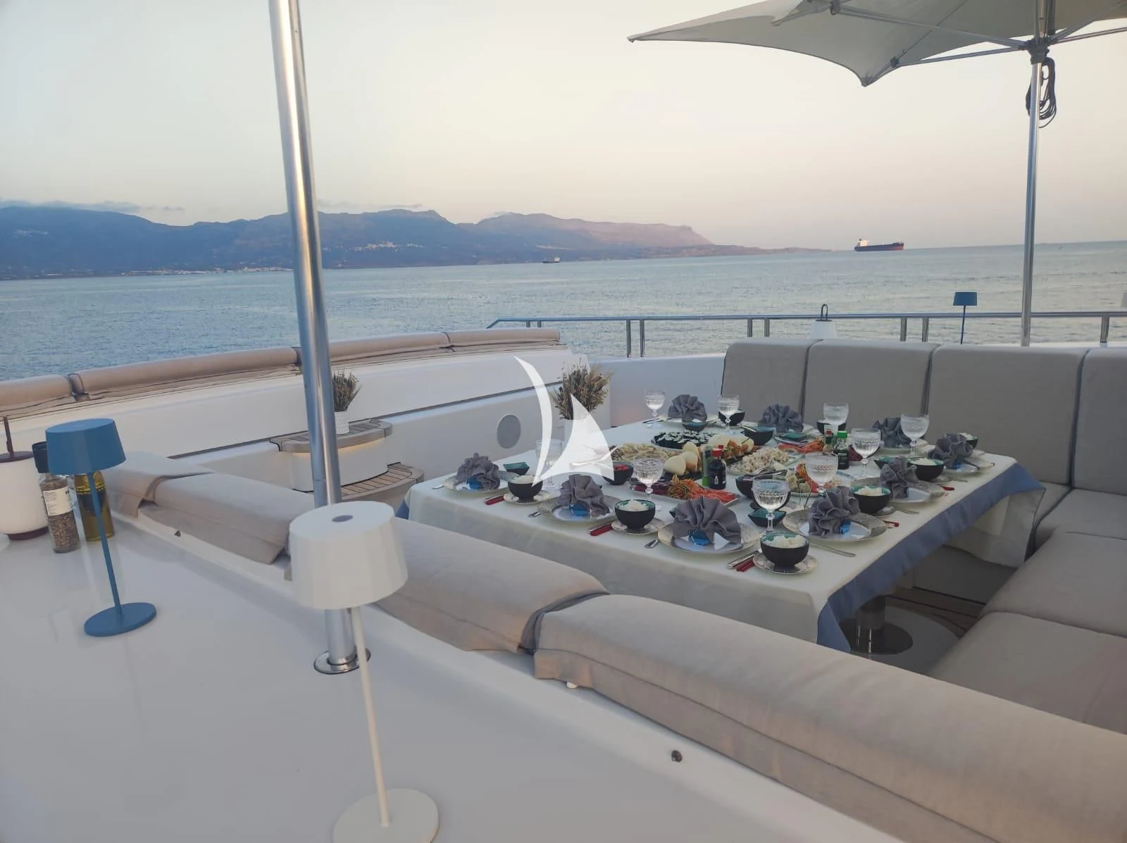 a table with food on it aboard IDEFIX II Yacht for Charter