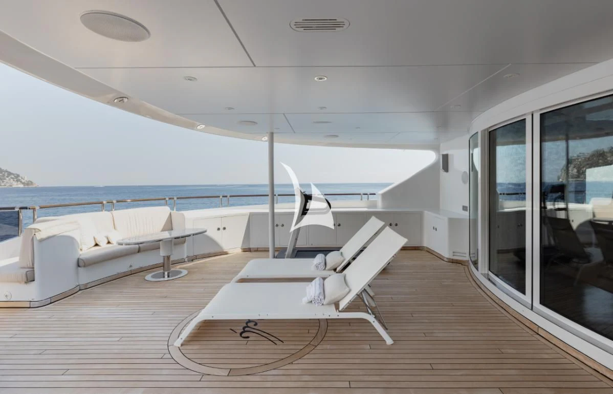 a room with a bed and a pool aboard IDEFIX II Yacht for Charter