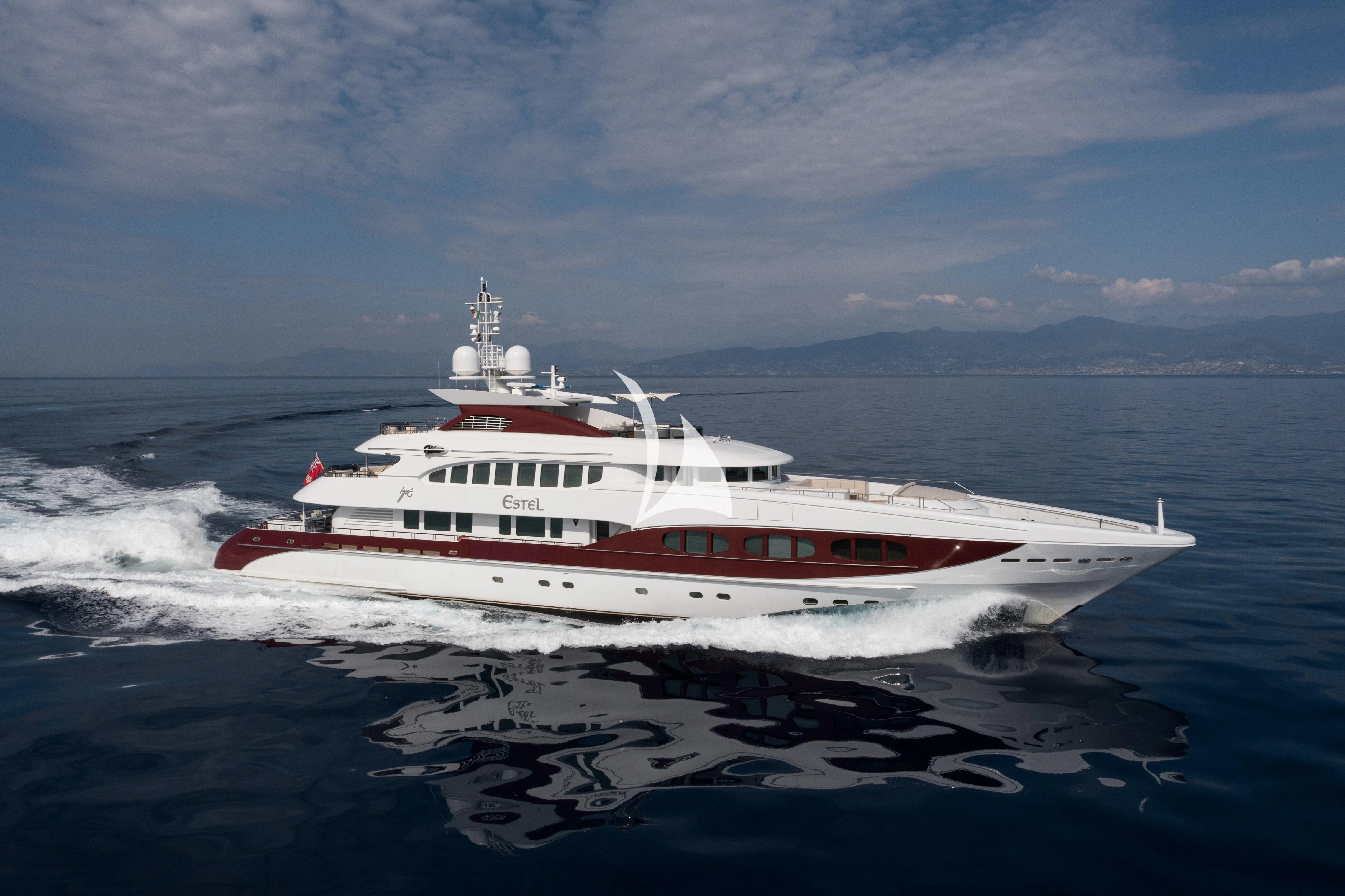 a white and red boat on water aboard IDEFIX II Yacht for Charter