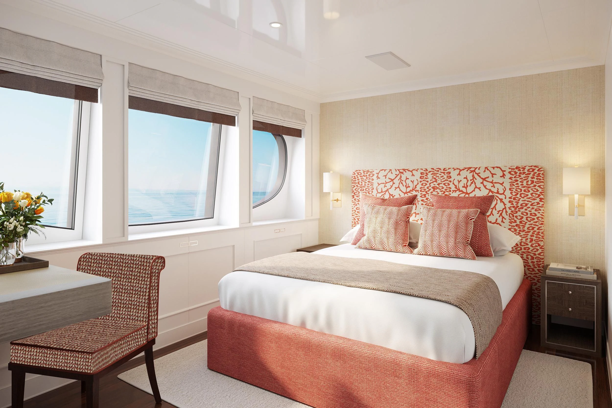 a bed with pink pillows aboard IDEFIX II Yacht for Charter