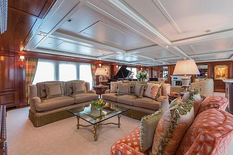 a living room with a large window aboard KATHARINE Yacht for Sale