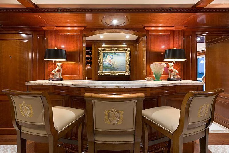 a room with a desk and chairs aboard KATHARINE Yacht for Sale