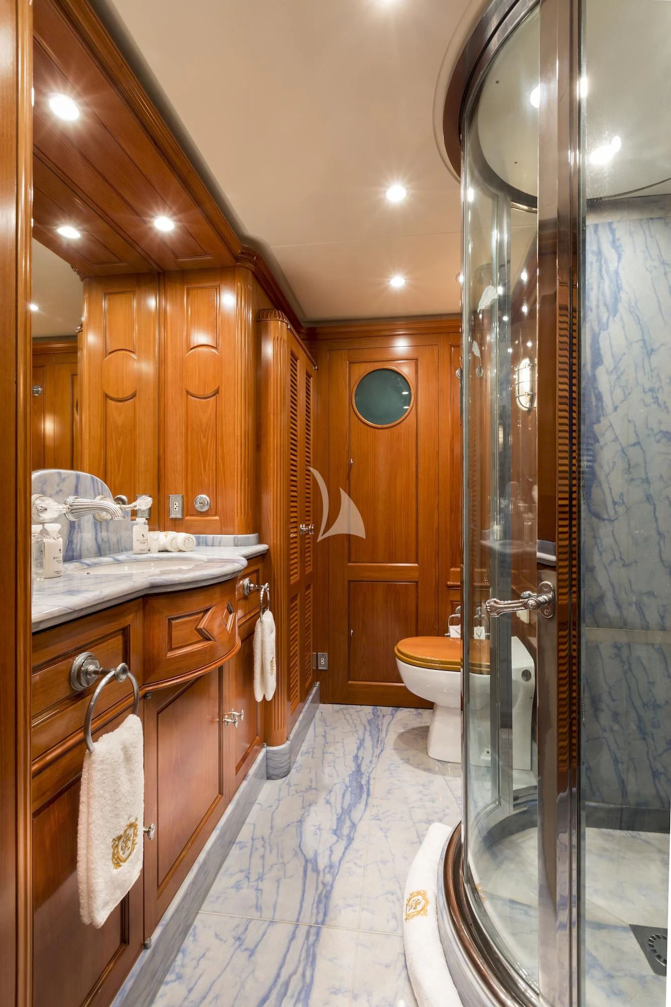 a bathroom with a glass shower aboard KATHARINE Yacht for Sale