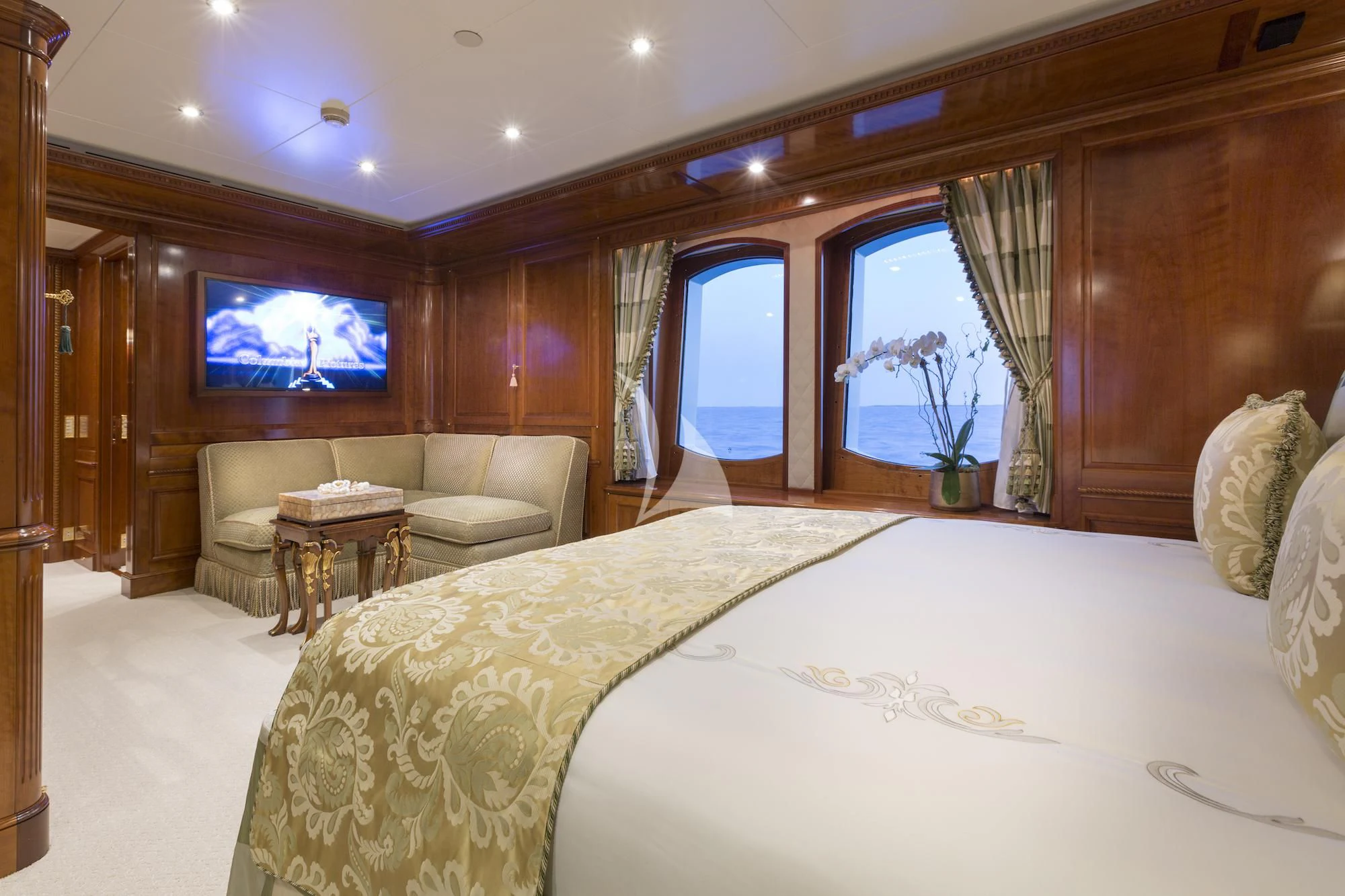 a hotel room with a bed and a tv aboard KATHARINE Yacht for Sale