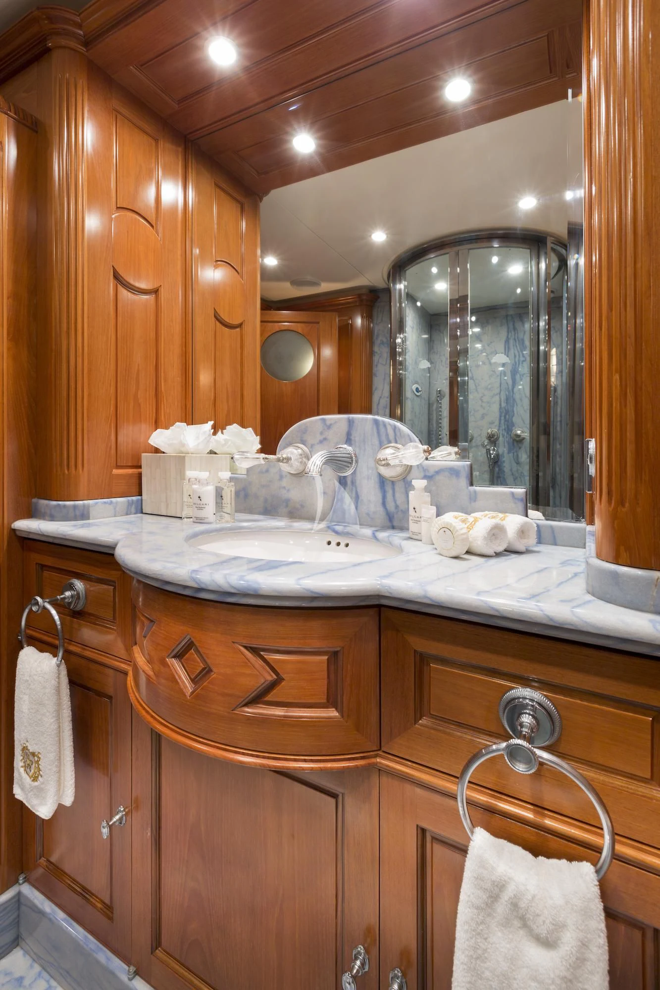 a bathroom with a large mirror aboard KATHARINE Yacht for Sale