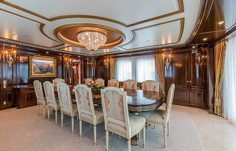 a fancy dining room with chairs aboard KATHARINE Yacht for Sale