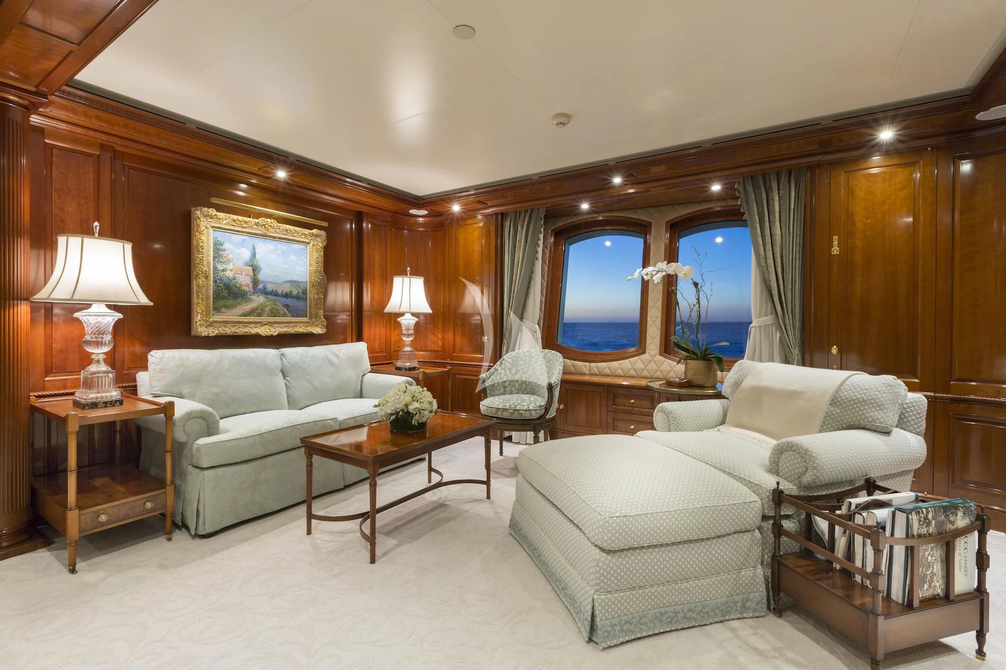 a living room with a large mirror aboard KATHARINE Yacht for Sale