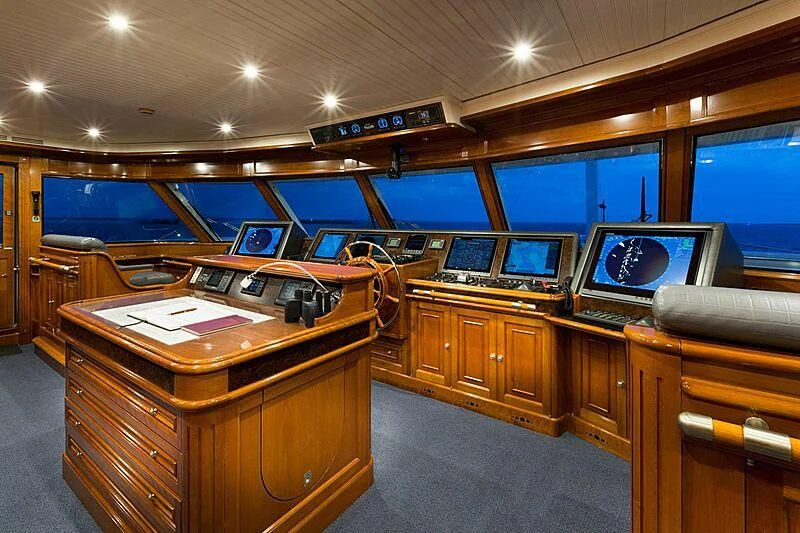 a room with a desk and computers aboard KATHARINE Yacht for Sale