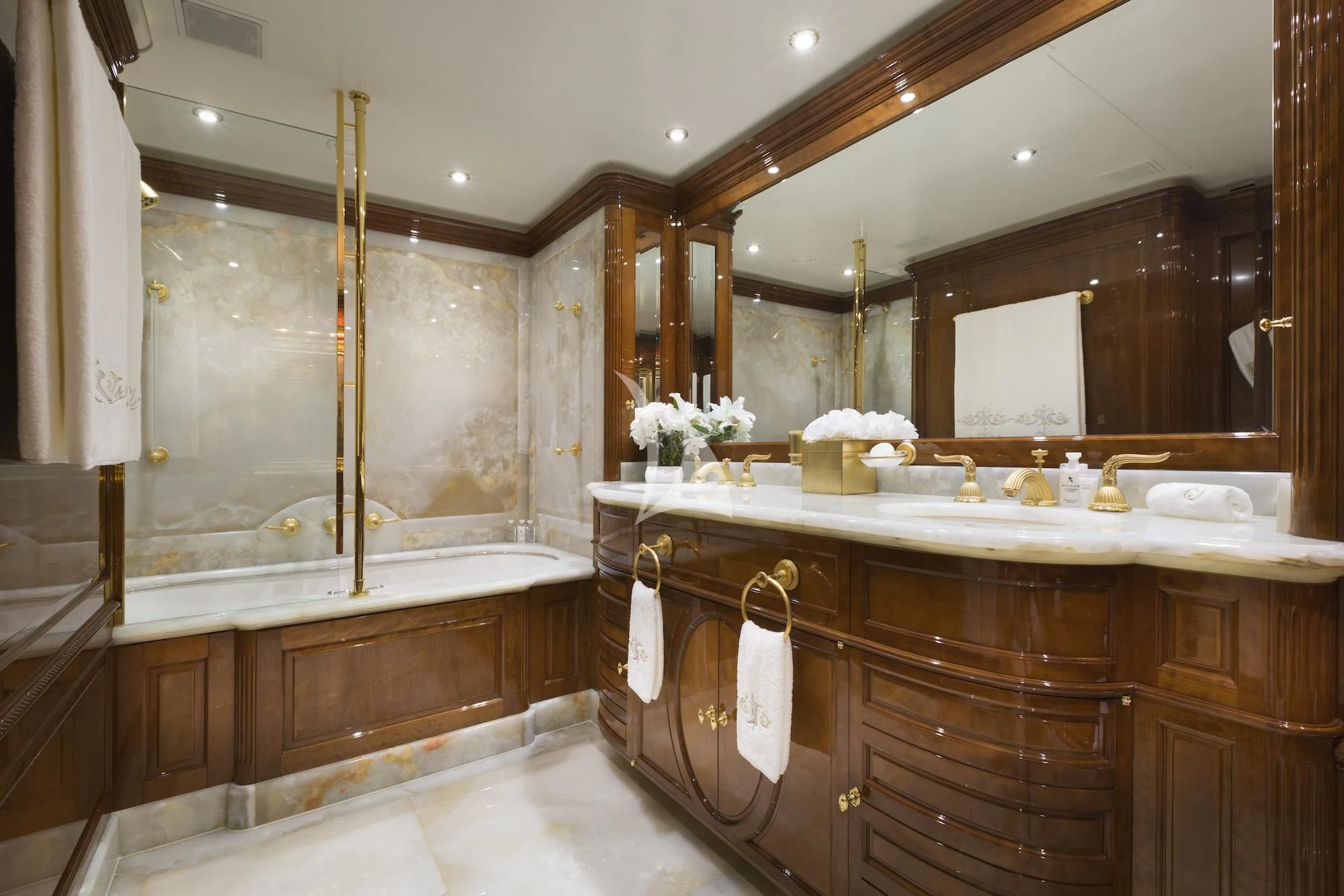 a bathroom with a large mirror aboard KATHARINE Yacht for Sale