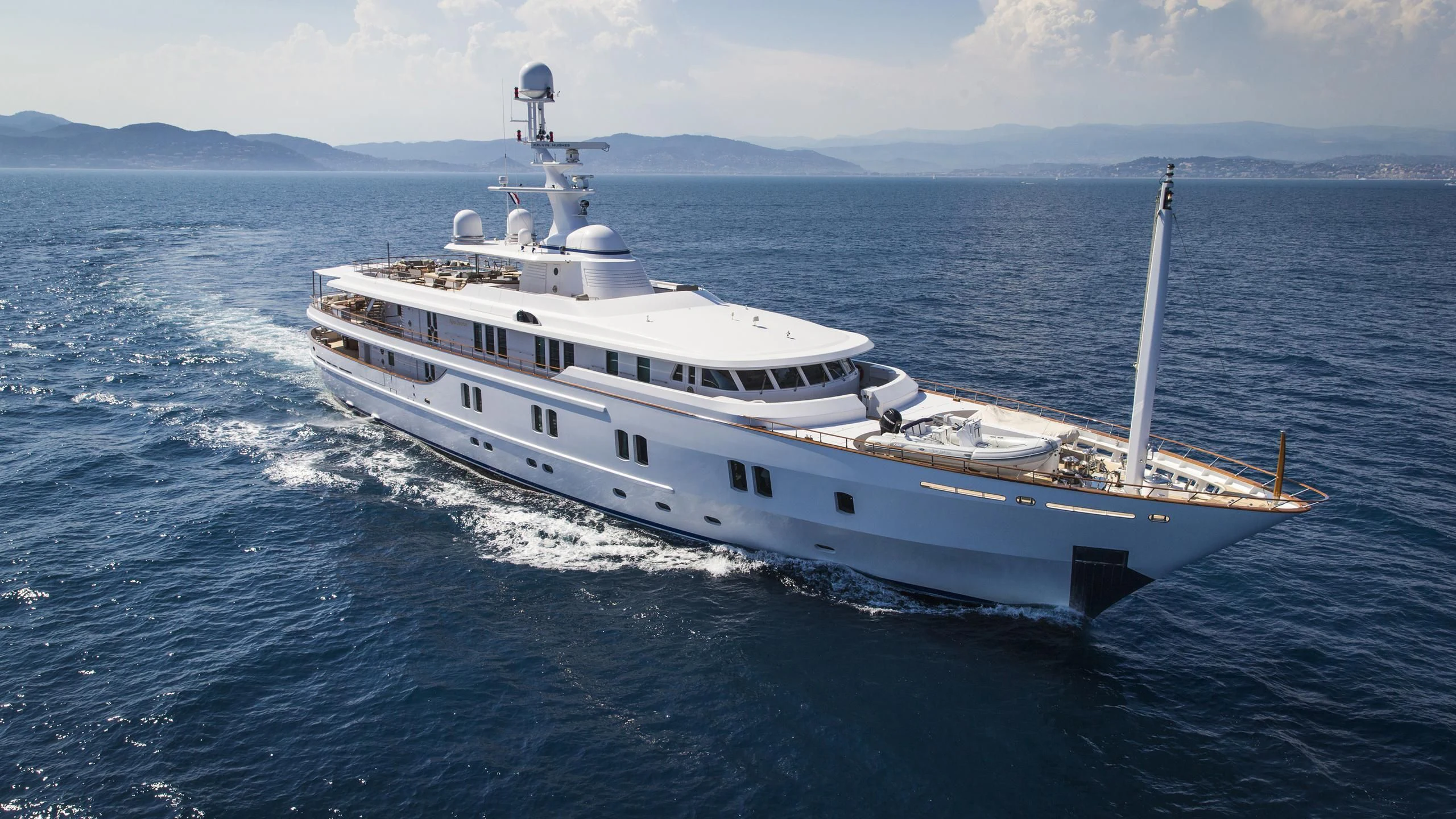 a large white boat in the water aboard KATHARINE Yacht for Sale