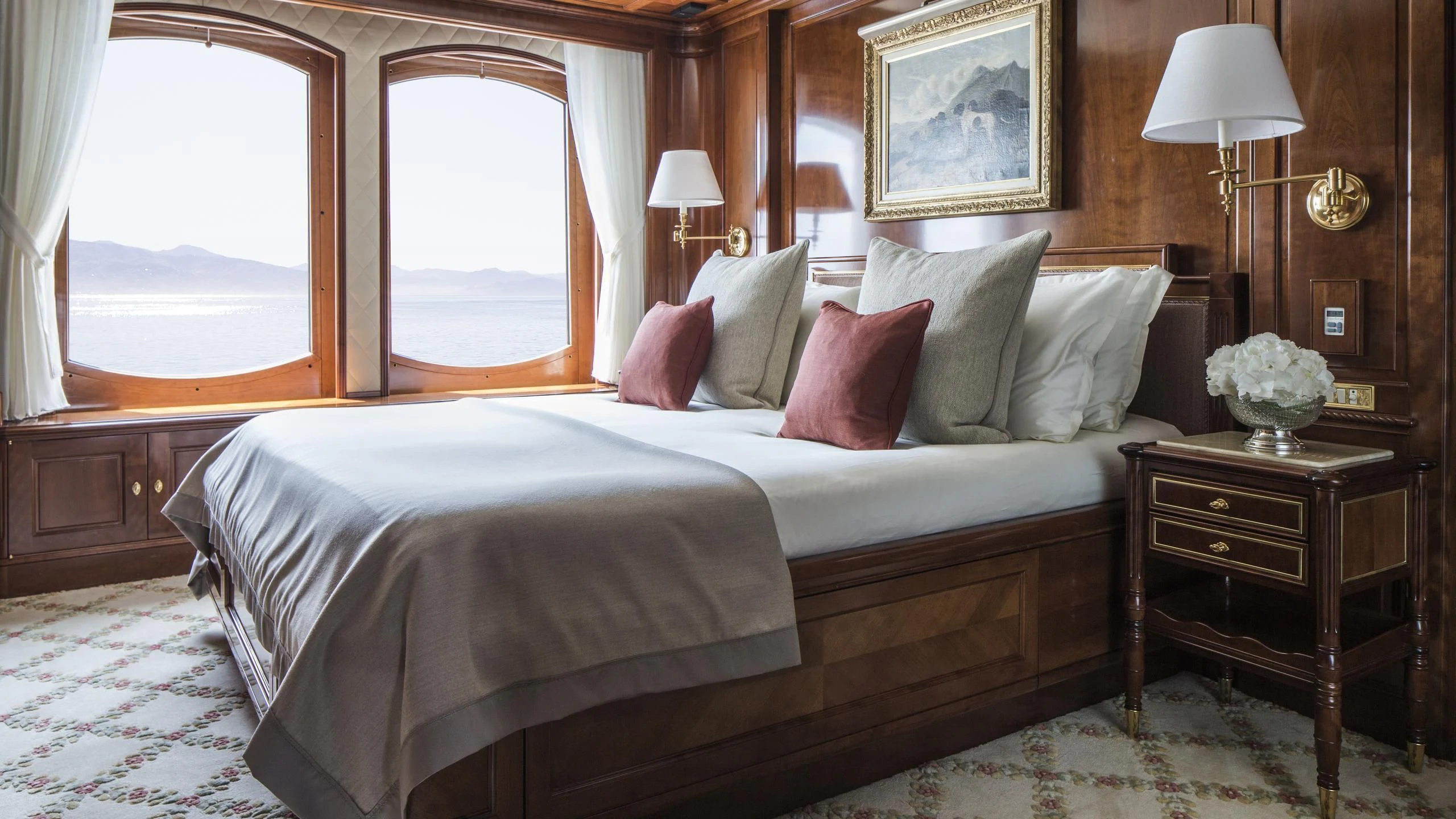 a bed with pillows and pillows aboard KATHARINE Yacht for Sale
