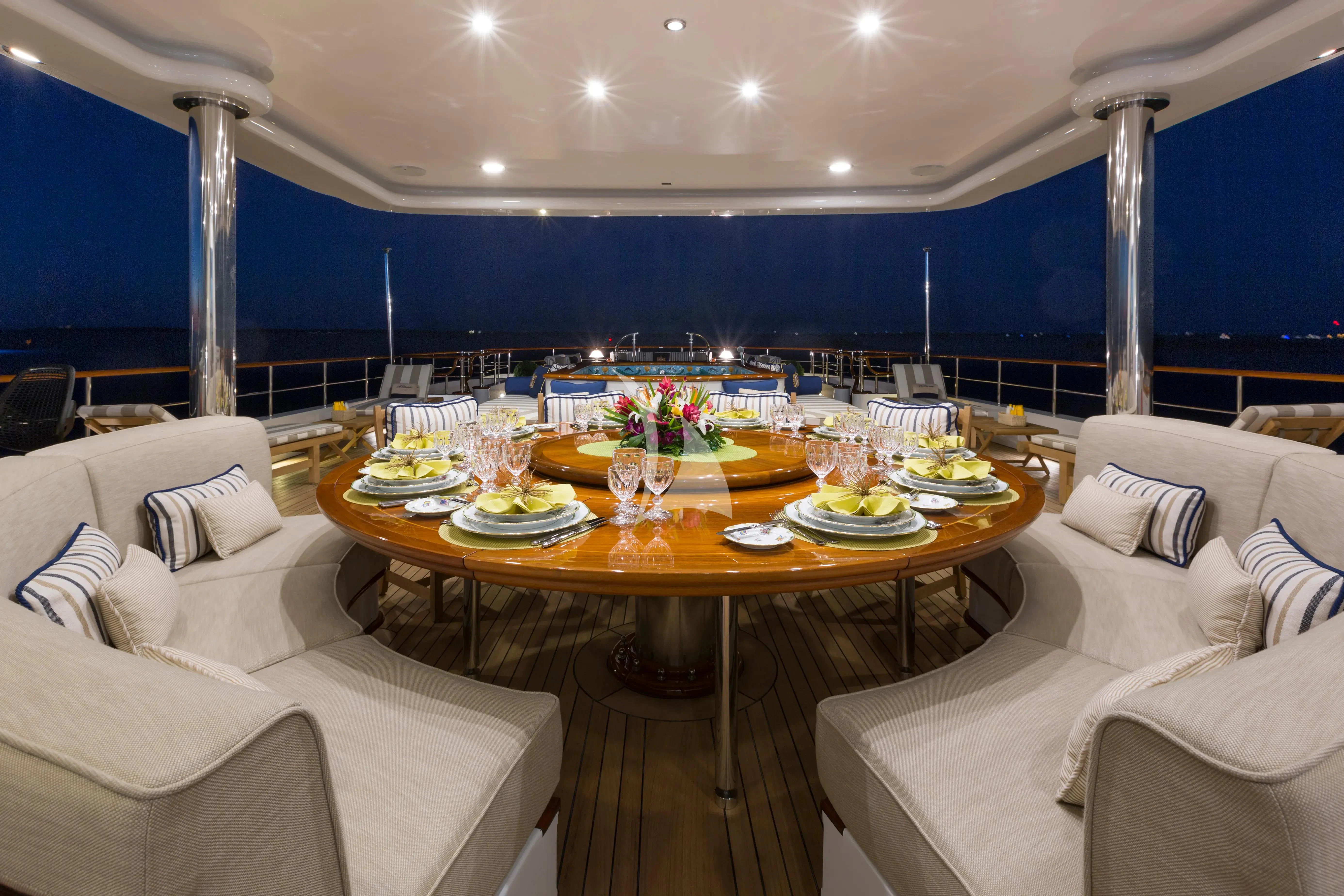 a table with plates and food on it aboard KATHARINE Yacht for Sale