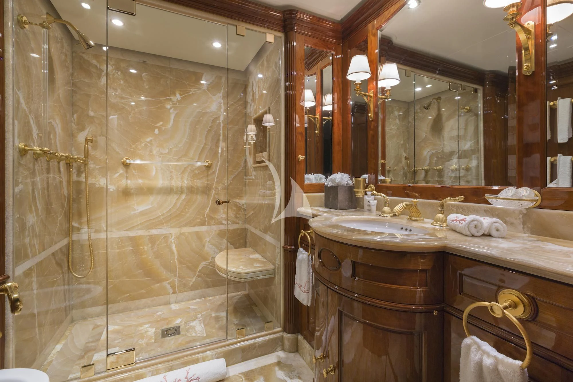 a bathroom with a large mirror aboard KATHARINE Yacht for Sale