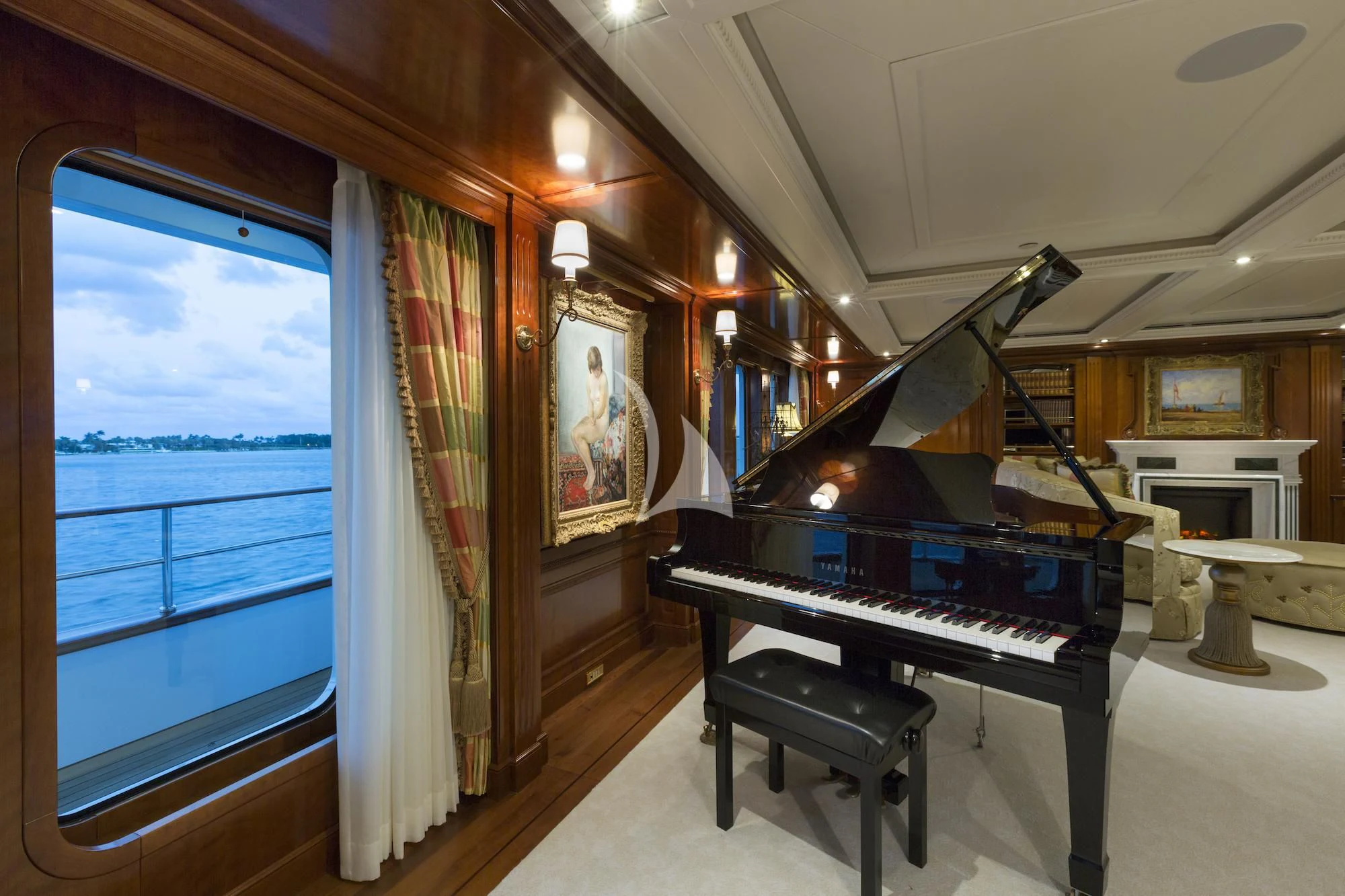 a piano in a room aboard KATHARINE Yacht for Sale