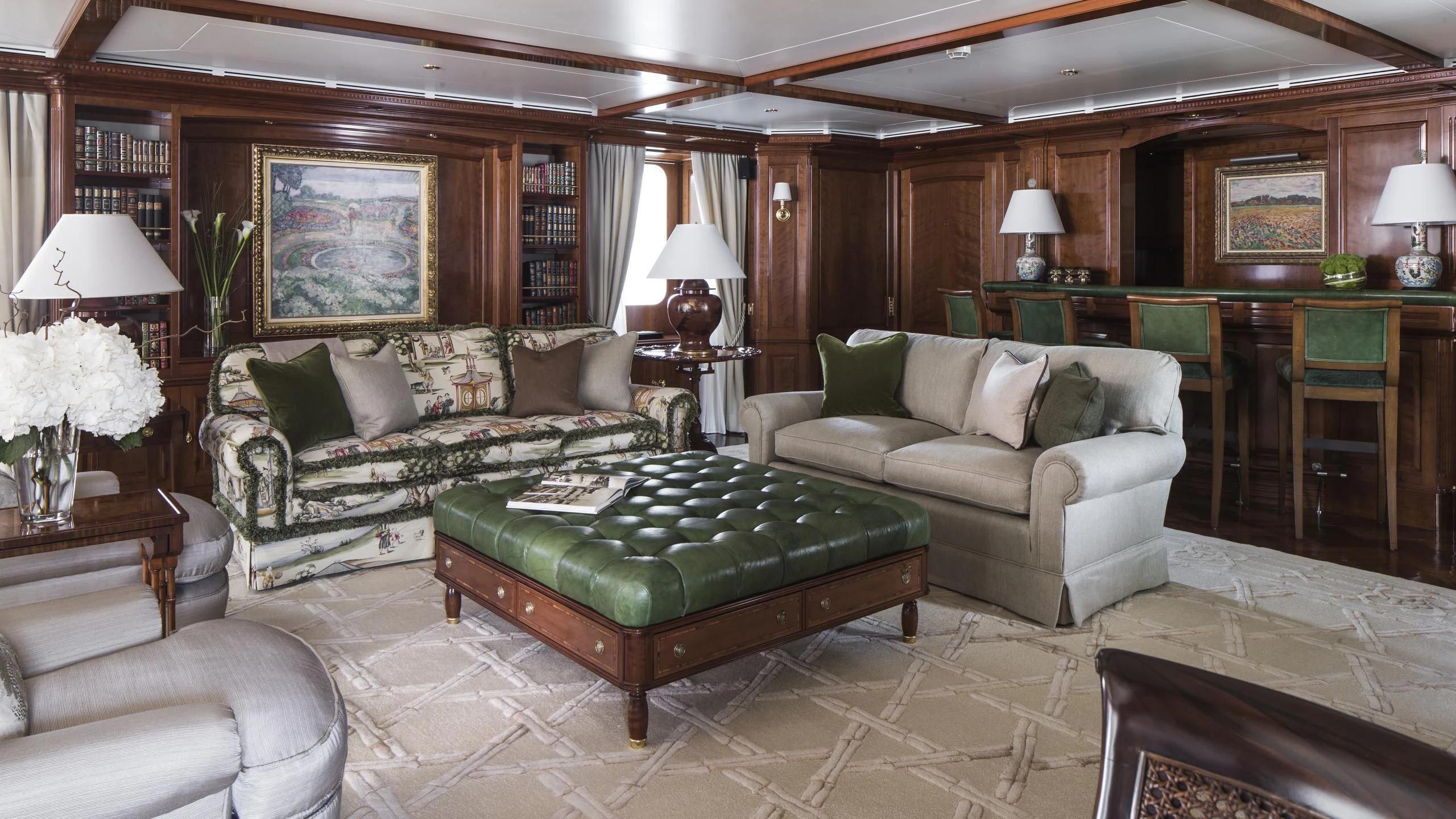 a living room with a couch and a coffee table aboard KATHARINE Yacht for Sale