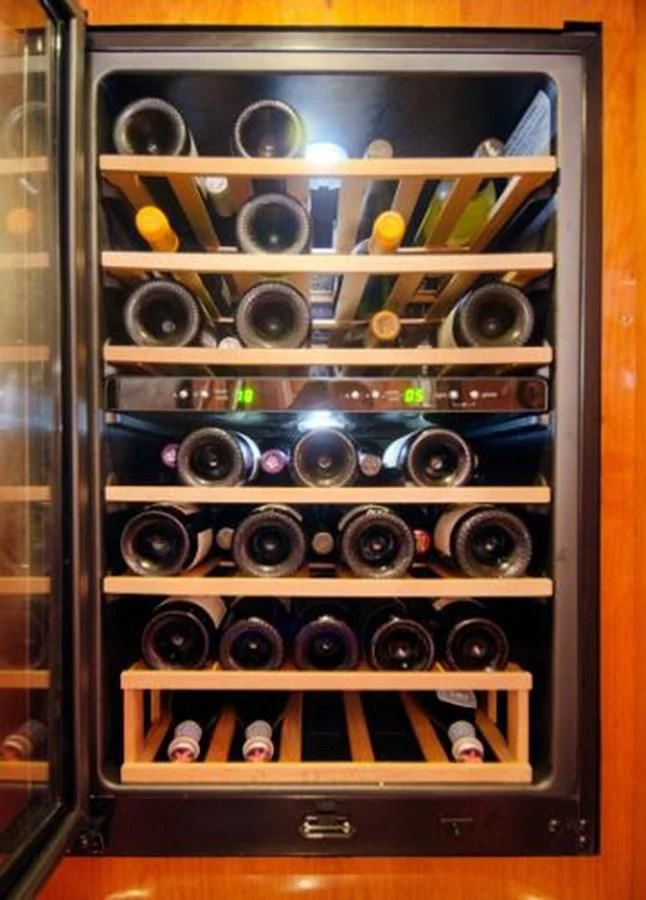 a cabinet with a large stack of speakers aboard 74' PRIVILEGE 2010 Yacht for Sale