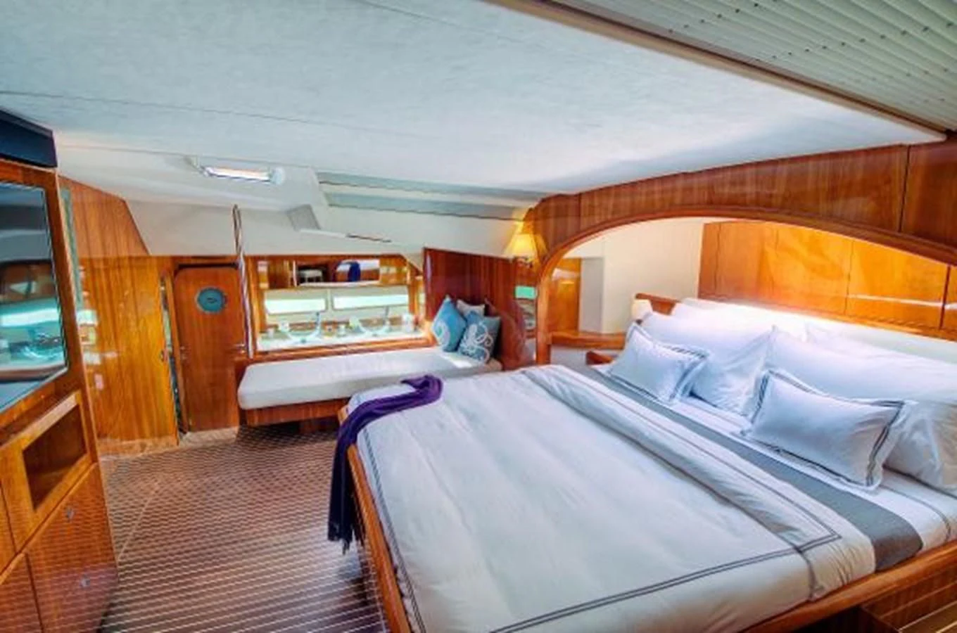 a room with two beds aboard 74' PRIVILEGE 2010 Yacht for Sale