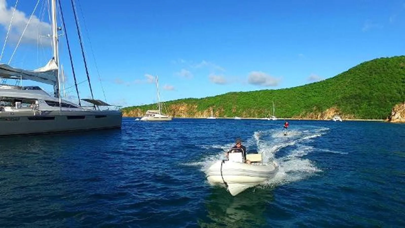 a person on a boat in the water aboard 74' PRIVILEGE 2010 Yacht for Sale
