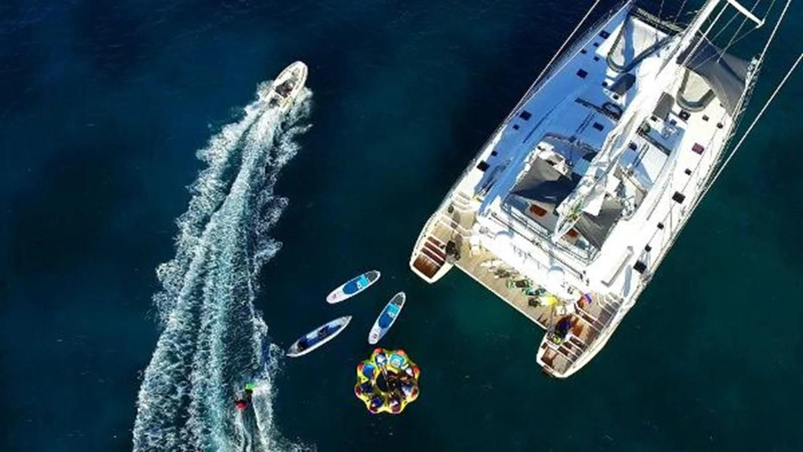 a group of people on a boat aboard 74' PRIVILEGE 2010 Yacht for Sale