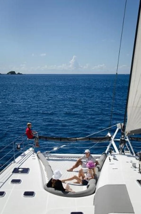 a group of people on a boat aboard 74' PRIVILEGE 2010 Yacht for Sale