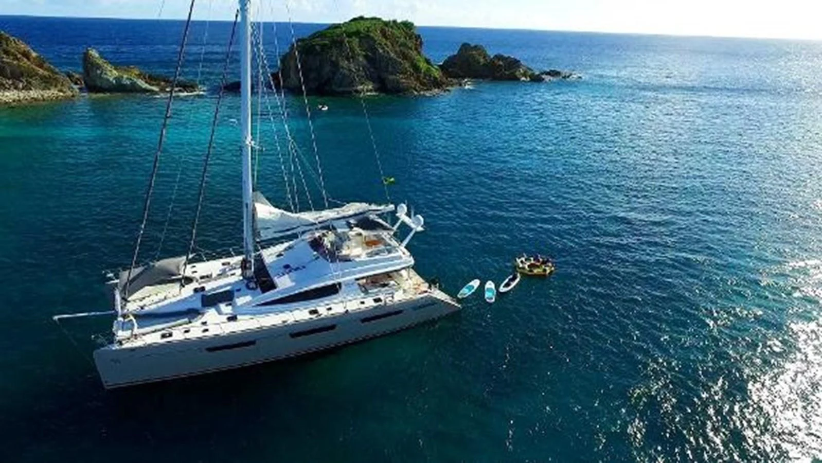 a boat sailing in the sea aboard 74' PRIVILEGE 2010 Yacht for Sale