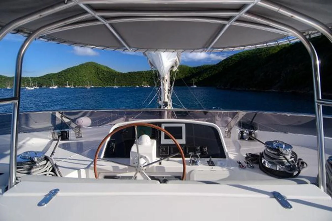 a boat with a view of the water and land below aboard 74' PRIVILEGE 2010 Yacht for Sale