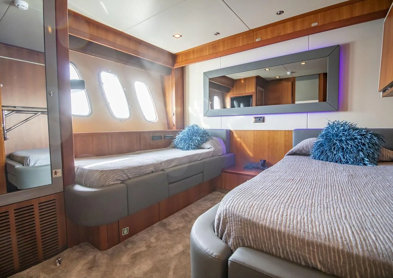 a room with two beds aboard LI-JOR Yacht for Sale