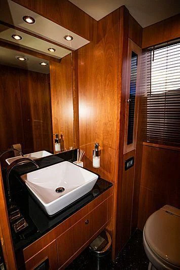 a bathroom with a sink and a toilet aboard LI-JOR Yacht for Sale