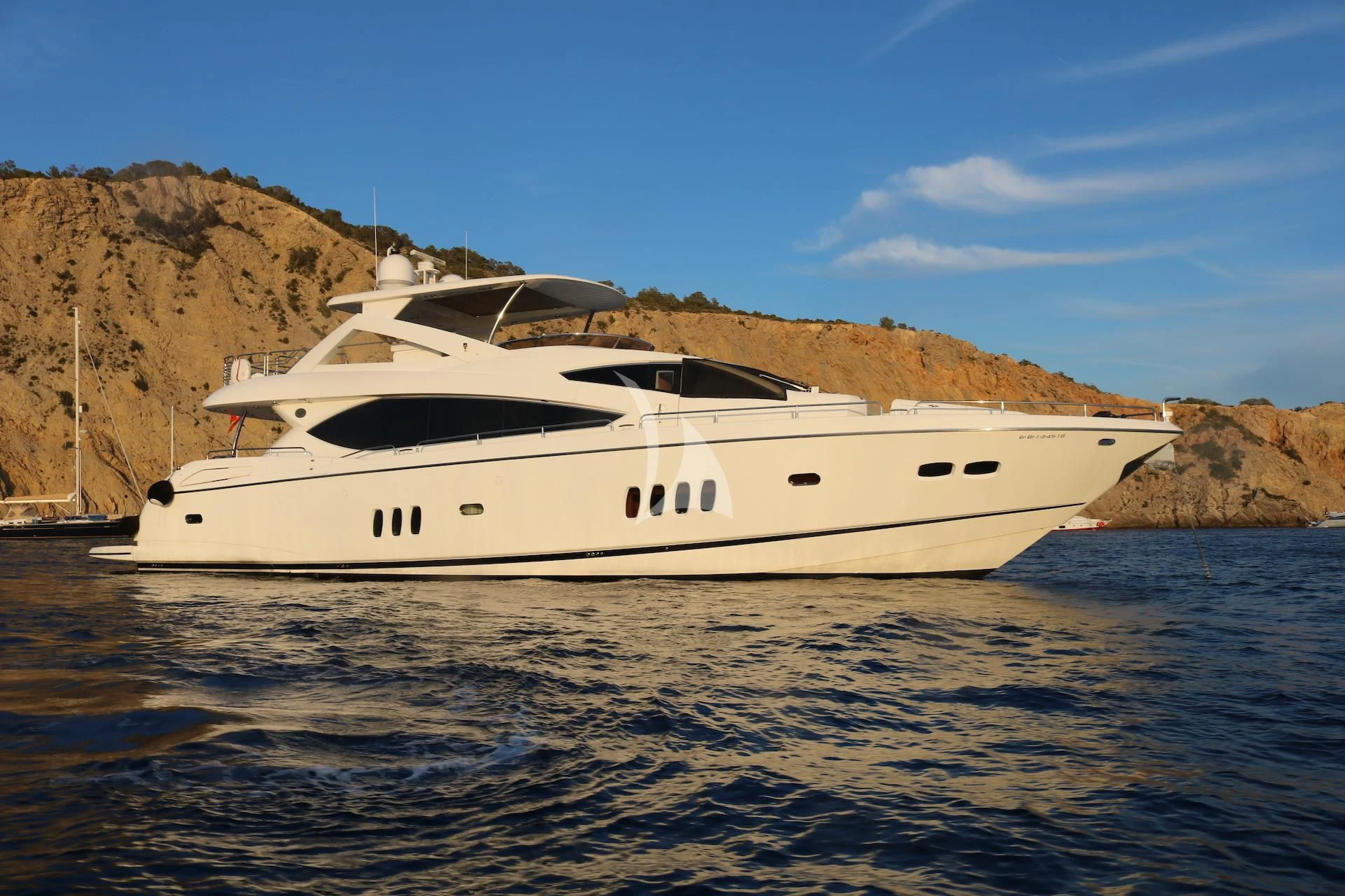 a white yacht in the water aboard LI-JOR Yacht for Sale