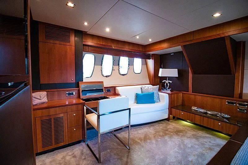a room with a couch and a table aboard LI-JOR Yacht for Sale