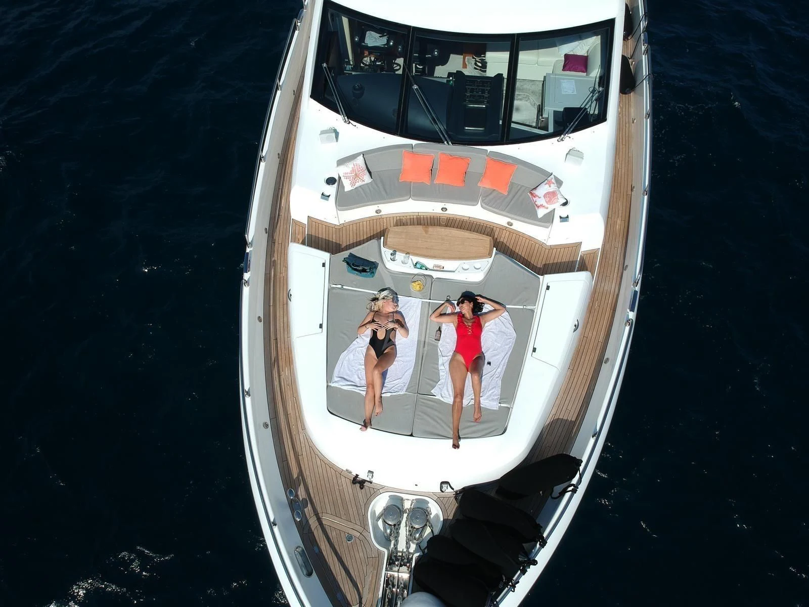a group of people standing on a boat aboard LI-JOR Yacht for Sale